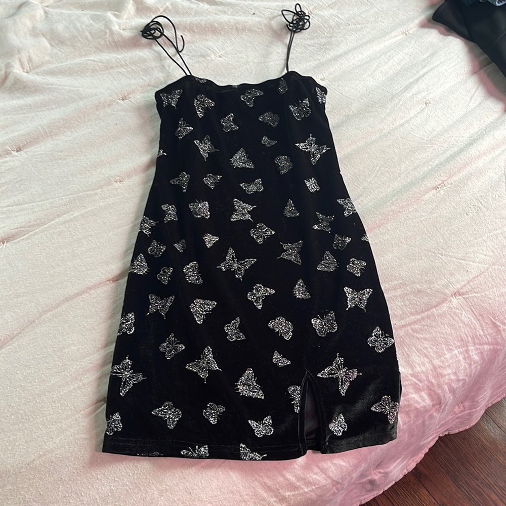 Bodycon mini black dress with silver glitter butterflies